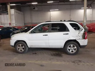 2009 Kia Sportage LX with VIN KNDJE723497563630, listed as a IAAI auction lot 41911423 with 213,040 mi miles. Bid and sale history available at carsss.com. Image 14.