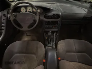 1999 Dodge Stratus z VIN 1B3EJ46X0XN690121, wystawiony jako Copart lot #83056374 z przebiegiem Nie podano mil oraz Szkoda całkowita • Salvage title. Historia ofert i sprzedaży dostępna na DreamBid. Obrazek 8.