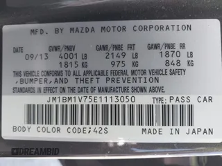 2014 Mazda 3 i Touring z VIN JM1BM1V75E1113050, wystawiony jako IAAI lot #42374782 z przebiegiem 94 571 mil mil oraz . Historia ofert i sprzedaży dostępna na DreamBid. Obrazek 9.