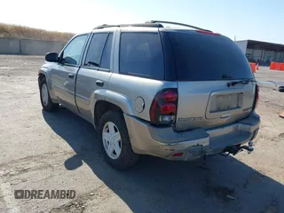 2003 Chevrolet TrailBlazer LTZ with VIN 1GNDT13S132412410, listed as a IAAI auction lot 42208015 with 351,588 mi miles and . Bid and sale history available at DreamBid. Image 3.