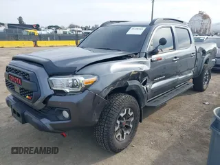 2021 Toyota Tacoma 4WD SR5 with VIN 3TMDZ5BN5MM110218, listed as a IAAI auction lot 41430303 with 47,781 mi miles. Bid and sale history available at carsss.com. Image 2.