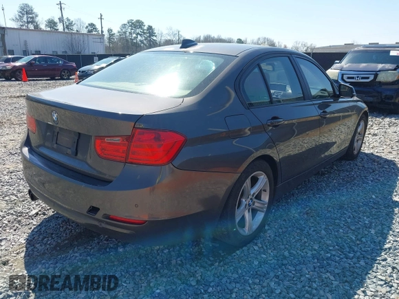 2014 BMW 3 Series 328i with VIN WBA3A5G57ENP28138, listed as a IAAI auction lot 41760371 with 147,897 mi miles and . Bid and sale history available at DreamBid. Image 4.