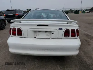 1997 Ford Mustang with VIN 1FALP4046VF180467, listed as a Copart auction lot 60754265 with 154,676 mi miles and Salvage title. Bid and sale history available at DreamBid. Image 6.