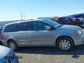 2016 Chrysler Town & Country Touring with VIN 2C4RC1BGXGR185642, listed as a IAAI auction lot 42092927 with 124,085 mi miles and . Bid and sale history available at DreamBid. Image 13.