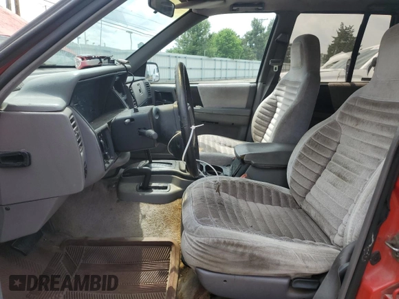 1994 Jeep Grand Cherokee Laredo с VIN 1J4GZ58S7RC311048, выставлен на аукционе Copart как лот 56759635 с пробегом 242 460 миль миль и Списание • Salvage title. История ставок и продаж доступна на DreamBid. Изображение 7.