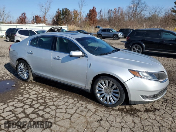 2014 Lincoln MKS with VIN 1LNHL9EK5EG606901, listed as a Copart auction lot 75300803 with 98,694 mi miles and Clean Title. Bid and sale history available at DreamBid. Image 4.