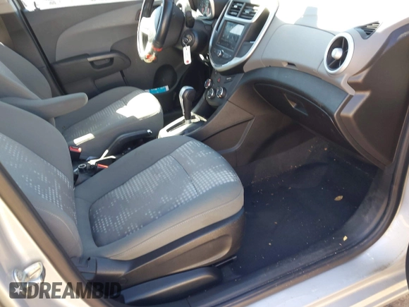 2018 Chevrolet Sonic LS with VIN 1G1JB5SH2J4112817, listed as a IAAI auction lot 41620486 with 60,479 mi miles and . Bid and sale history available at DreamBid. Image 5.