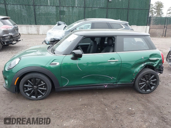 2021 MINI Hardtop Cooper with VIN WMWXR3C09M2N45834, listed as a IAAI auction lot 41892670 with 10,512 mi miles and . Bid and sale history available at DreamBid. Image 14.