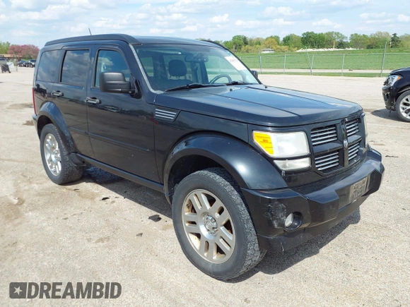 2011 Dodge Nitro Heat with VIN 1D4PU4GX9BW607580, listed as a IAAI auction lot 42105529 with 143,795 mi miles. Bid and sale history available at carsss.com. Image 1.