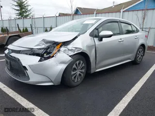 2022 Toyota Corolla Hybrid LE with VIN JTDEAMDE9NJ042023, listed as a IAAI auction lot 41492907 with 59,014 mi miles. Bid and sale history available at carsss.com. Image 18.
