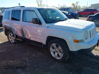 2014 Jeep Patriot Latitude with VIN 1C4NJPFB0ED719270, listed as a IAAI auction lot 40870355 with 207,613 mi miles and . Bid and sale history available at DreamBid. Image 1.
