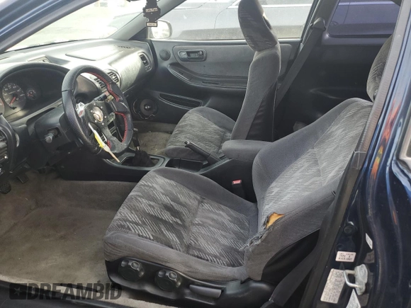 1998 Acura Integra LS with VIN JH4DC445XWS015414, listed as a Copart auction lot 82069724 with 69,420 mi miles and Salvage title. Bid and sale history available at DreamBid. Image 7.