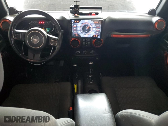 2012 Jeep Wrangler Unlimited Sahara with VIN 1C4BJWEG3CL195271, listed as a Copart auction lot 59947235 with 212,819 mi miles and Salvage title. Bid and sale history available at DreamBid. Image 8.