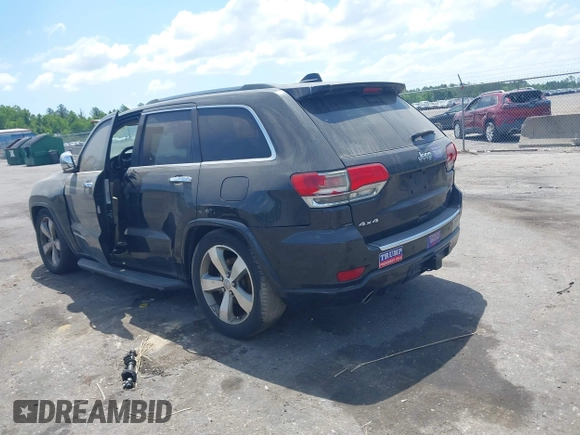 2015 Jeep Grand Cherokee Overland with VIN 1C4RJFCT9FC859740, listed as a IAAI auction lot 42187933 with 231,481 mi miles. Bid and sale history available at carsss.com. Image 3.