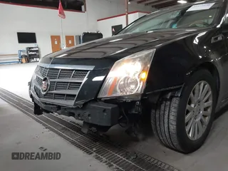 2011 Cadillac CTS Luxury with VIN 1G6DG5EYXB0145058, listed as a IAAI auction lot 41973156 with 143,246 mi miles and . Bid and sale history available at carsss.com. Image 6.