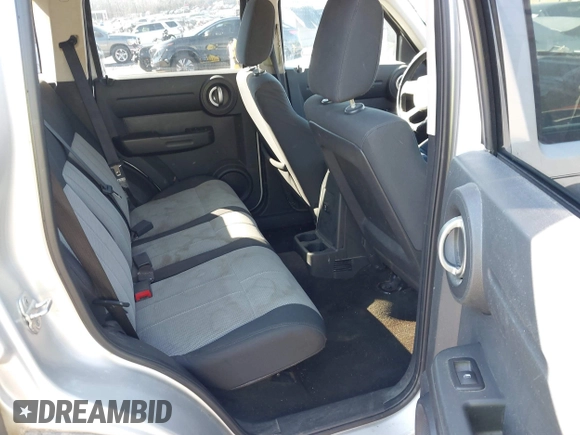 2007 Dodge Nitro SXT with VIN 1D8GT28K97W642118, listed as a IAAI auction lot 41276172 with 385,441 mi miles. Bid and sale history available at carsss.com. Image 8.