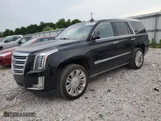2019 Cadillac Escalade Platinum with VIN 1GYS4DKJ3KR201247, listed as a Copart auction lot 59018654 with 144,596 mi miles and Salvage Title. Bid and sale history available at carsss.com. Image 1.