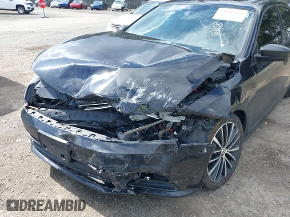 2016 Volkswagen Jetta Sport z VIN 3VWD17AJ1GM290252, wystawiony jako IAAI lot #41947953 z przebiegiem 125 484 mil mil oraz . Historia ofert i sprzedaży dostępna na DreamBid. Obrazek 6.