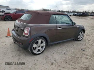 2011 MINI Convertible S with VIN WMWZP3C58BTX83725, listed as a Copart auction lot 44418965 with 45,401 mi miles and Salvage title. Bid and sale history available at DreamBid. Image 3.