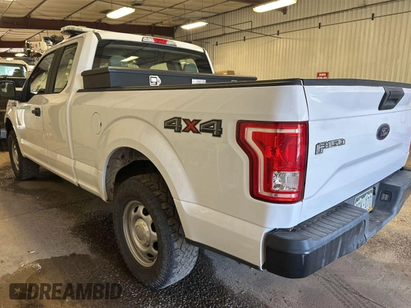 2017 Ford F-150 XL with VIN 1FTEX1E82HKD27618, listed as a IAAI auction lot 42796140 with 124,457 mi miles and . Bid and sale history available at DreamBid. Image 3.