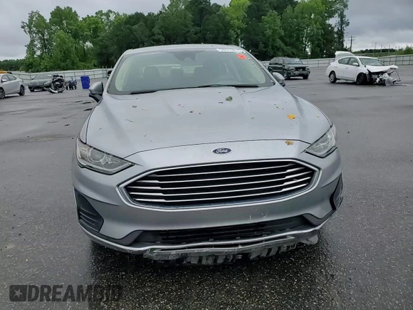 2020 Ford Fusion SE z VIN 3FA6P0HD0LR256243, wystawiony jako Copart lot #56513215 z przebiegiem 59 996 mil mil oraz Szkoda całkowita • Salvage title. Historia ofert i sprzedaży dostępna na DreamBid. Obrazek 13.