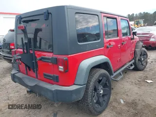 2008 Jeep Wrangler Unlimited X with VIN 1J4GA39138L550936, listed as a IAAI auction lot 41333939 with 181,936 mi miles and . Bid and sale history available at DreamBid. Image 4.