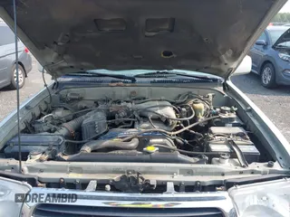 2000 Toyota 4Runner SR5 z VIN JT3HN86R7Y0290729, wystawiony jako IAAI lot #42409622 z przebiegiem 315 804 mil mil oraz . Historia ofert i sprzedaży dostępna na DreamBid. Obrazek 10.