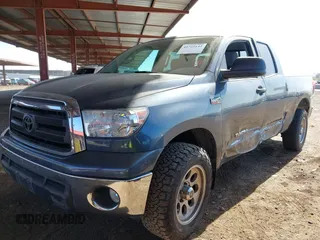 2010 Toyota Tundra 4WD Truck with VIN 5TFUY5F18AX111590, listed as a IAAI auction lot 41725142 with 116,360 mi miles. Bid and sale history available at carsss.com. Image 2.
