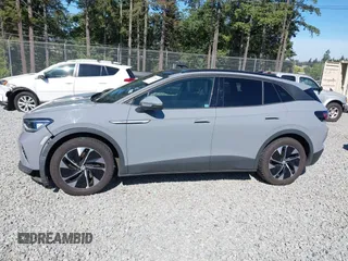 2021 Volkswagen ID.4 Pro S z VIN WVGTMPE20MP058882, wystawiony jako IAAI lot #42317440 z przebiegiem 64 473 mil mil oraz . Historia ofert i sprzedaży dostępna na DreamBid. Obrazek 14.