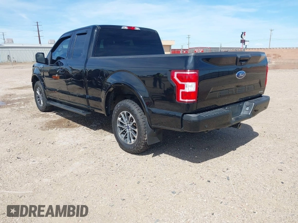 2018 Ford F-150 XL with VIN 1FTEX1EP7JFC21008, listed as a IAAI auction lot 42072145 with 102,679 mi miles and . Bid and sale history available at DreamBid. Image 3.