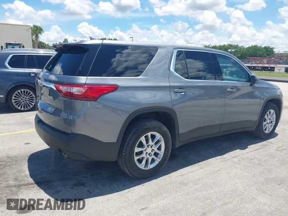 2018 Chevrolet Traverse LS z VIN 1GNEVFKW0JJ202173, wystawiony jako IAAI lot #42494931 z przebiegiem 85 209 mil mil oraz . Historia ofert i sprzedaży dostępna na DreamBid. Obrazek 4.