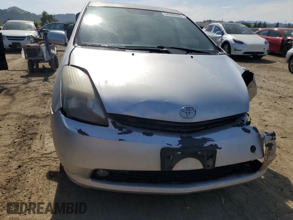 2005 Toyota Prius with VIN JTDKB20U553063053, listed as a Copart auction lot 54088395 with 265,999 mi miles and Salvage Title. Bid and sale history available at DreamBid. Image 5.