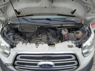 2016 Ford Transit Cargo z VIN 1FTYR2CGXGKB30136, wystawiony jako Copart lot #89067675 z przebiegiem 141 445 mil mil oraz Czysty tytuł • Clean title. Historia ofert i sprzedaży dostępna na DreamBid. Obrazek 11.