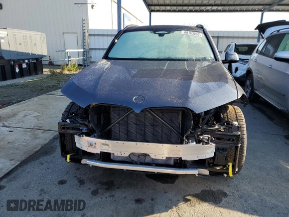 2022 BMW X5 xDrive45e with VIN 5UXTA6C04N9J66273, listed as a Copart auction lot 69163062 with 7,464 mi miles. Bid and sale history available at carsss.com. Image 5.