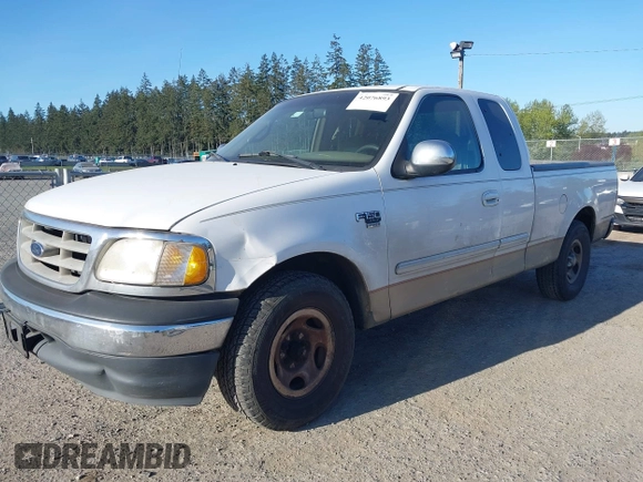2000 Ford F-150 XL with VIN 1FTRX17W4YKA47244, listed as a IAAI auction lot 42076893 with 362,114 mi miles. Bid and sale history available at carsss.com. Image 2.