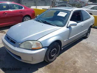 1996 Honda Civic EX with VIN 1HGEJ8241TL022546, listed as a IAAI auction lot 42036699 with 156,980 mi miles. Bid and sale history available at carsss.com. Image 2.