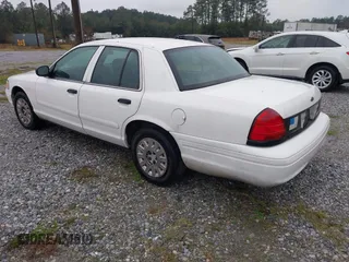2005 Ford Police Interceptor z VIN 2FAFP71W25X139210, wystawiony jako IAAI lot #41609177 z przebiegiem 114 755 mil mil oraz . Historia ofert i sprzedaży dostępna na DreamBid. Obrazek 3.