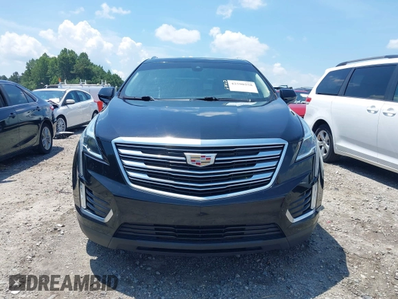 2018 Cadillac XT5 Premium Luxury AWD z VIN 1GYKNFRS3JZ112459, wystawiony jako IAAI lot #42590258 z przebiegiem 157 377 mil mil oraz . Historia ofert i sprzedaży dostępna na DreamBid. Obrazek 12.