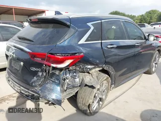 2019 Infiniti QX50 Luxe with VIN 3PCAJ5M14KF110183, listed as a IAAI auction lot 42323546 with 63,757 mi miles and . Bid and sale history available at DreamBid. Image 4.