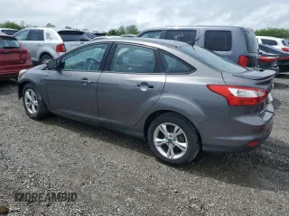 2012 Ford Focus SE with VIN 1FAHP3F27CL335046, listed as a Copart auction lot 55235175 with 128,119 mi miles and Salvage title. Bid and sale history available at DreamBid. Image 2.