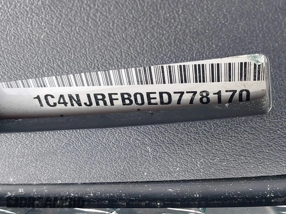 2014 Jeep Patriot Latitude with VIN 1C4NJRFB0ED778170, listed as a IAAI auction lot 41870418 with 54,624 mi miles. Bid and sale history available at carsss.com. Image 9.