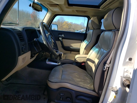 2007 Hummer H3 SUV with VIN 5GTDN13E578118131, listed as a Copart auction lot 79764704 with 167,292 mi miles and Clean Title. Bid and sale history available at DreamBid. Image 7.