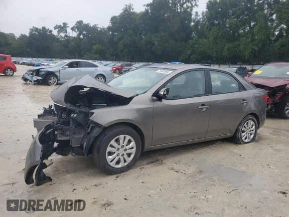 2010 Kia Forte EX with VIN KNAFU4A21A5199583, listed as a Copart auction lot 71681954 with 185,329 mi miles and Salvage Title. Bid and sale history available at carsss.com. Image 1.