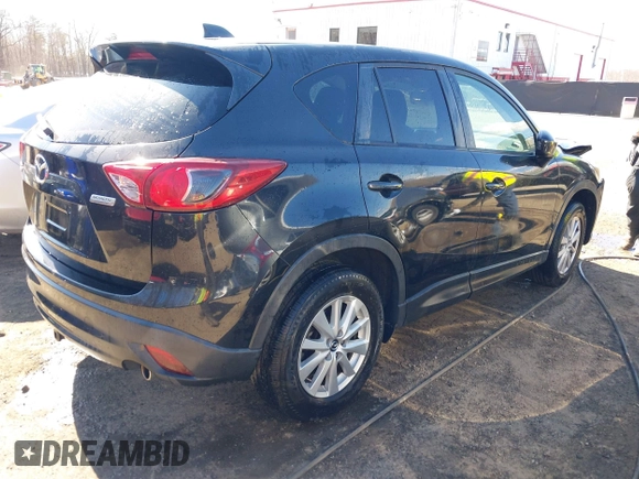 2013 Mazda CX-5 Touring with VIN JM3KE2CE3D0105660, listed as a IAAI auction lot 41876399 with 156,618 mi miles. Bid and sale history available at carsss.com. Image 4.