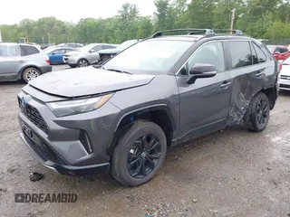 2024 Toyota RAV4 Hybrid XSE with VIN 4T3E6RFV5RU142476, listed as a IAAI auction lot 42524206 with 11,852 mi miles and . Bid and sale history available at DreamBid. Image 2.