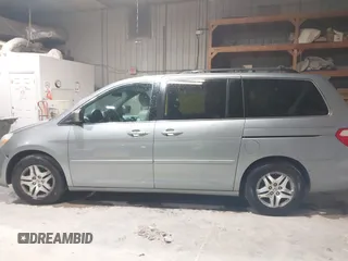 2007 Honda Odyssey EX-L with VIN 5FNRL38697B012944, listed as a IAAI auction lot 42144250 with 234,016 mi miles and . Bid and sale history available at DreamBid. Image 14.