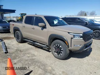 2024 Nissan Frontier Pro-4X with VIN 1N6ED1EK7RN610467, listed as a Copart auction lot 50138015 with 24,723 mi miles and Salvage title. Bid and sale history available at DreamBid. Image 4.