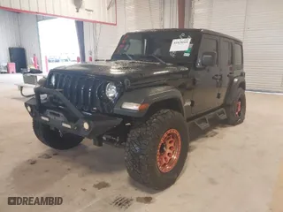 2019 Jeep Wrangler Unlimited Sport with VIN 1C4HJXDG7KW528649, listed as a IAAI auction lot 41029000 with 112,561 mi miles. Bid and sale history available at carsss.com. Image 2.