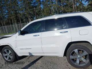 2015 Jeep Grand Cherokee Overland with VIN 1C4RJFCT6FC653386, listed as a IAAI auction lot 42084723 with 101,993 mi miles. Bid and sale history available at carsss.com. Image 14.