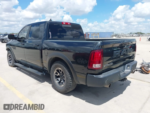 2017 Ram 1500 Rebel with VIN 1C6RR7YT5HS502546, listed as a IAAI auction lot 40218006 with 118,546 mi miles and . Bid and sale history available at DreamBid. Image 3.